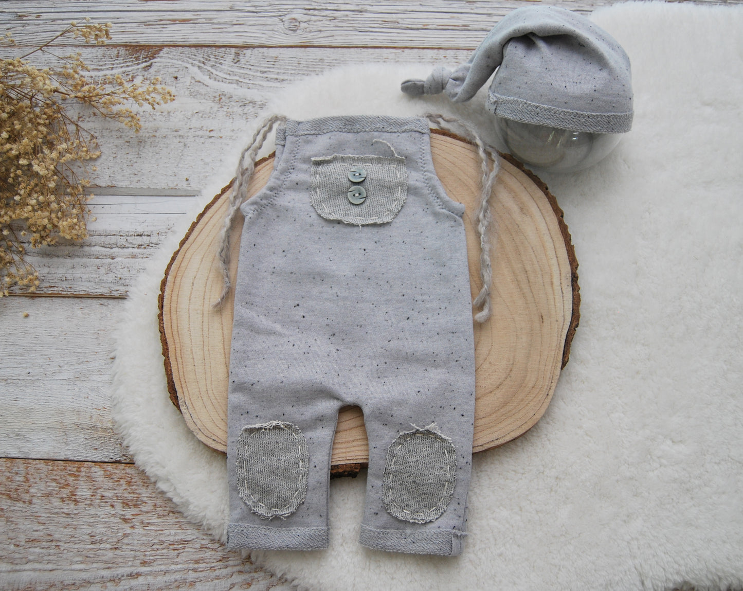 Neutral gray baby boy photo outfit: romper and sleepy hat