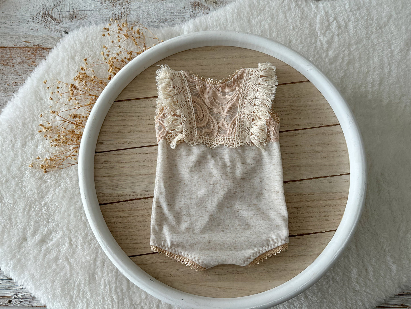 Beige newborn romper with fringe lace detail ideal for newborn photography