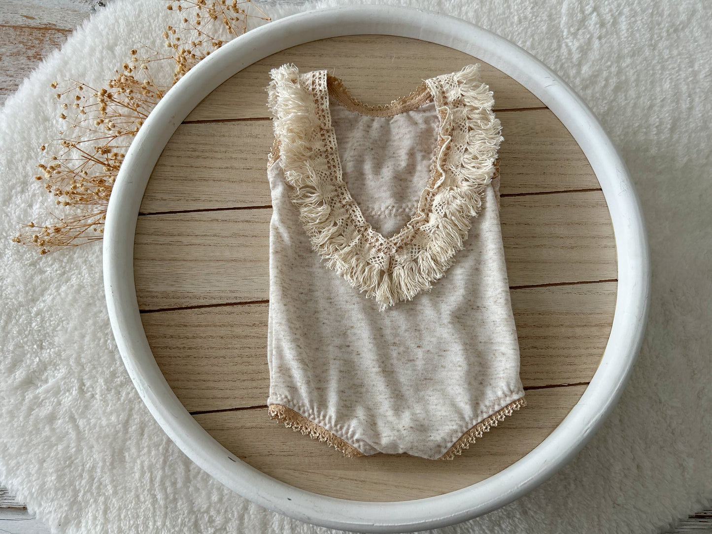 Back view of vintage-inspired romper with V lace neckline