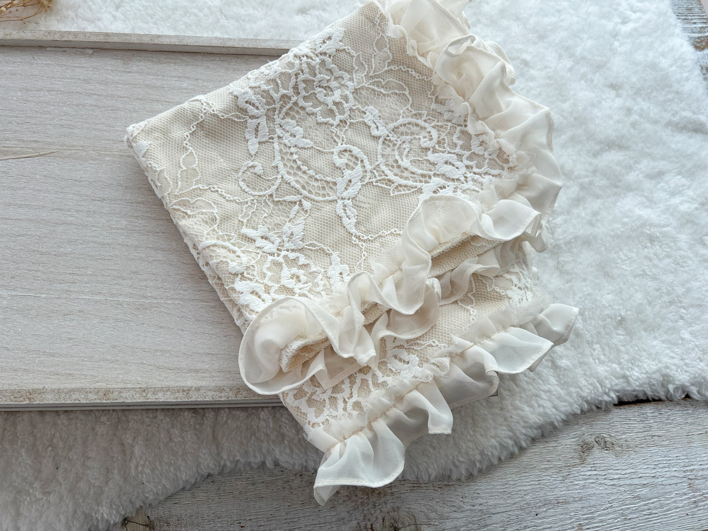 Ruffled newborn layer that is decorated with ruffles on margins.
