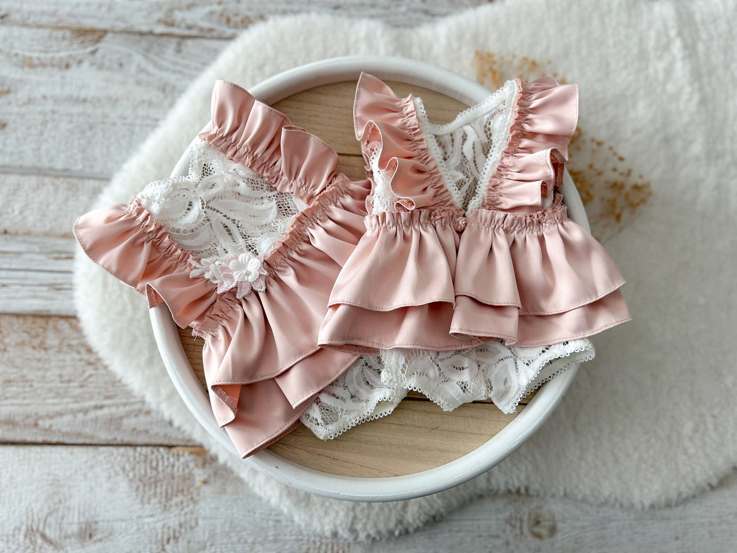 Baby girl outfit with satin shoulder ruffles and layered ruffle back