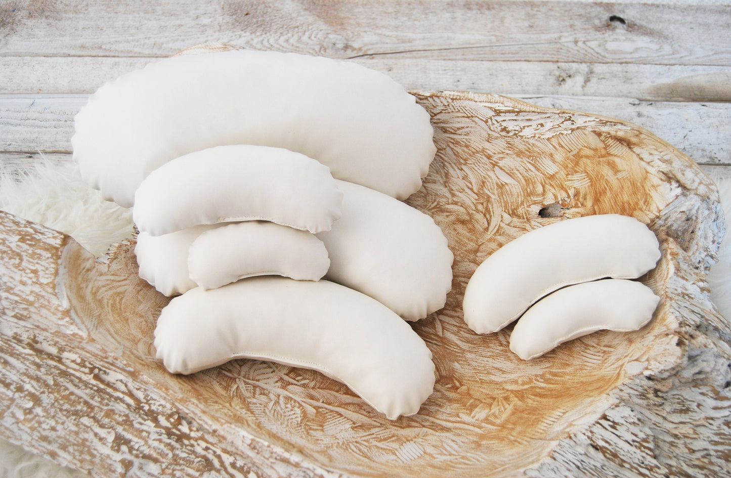 Close-up of the newborn posing pillows showing their soft texture and flexible shape