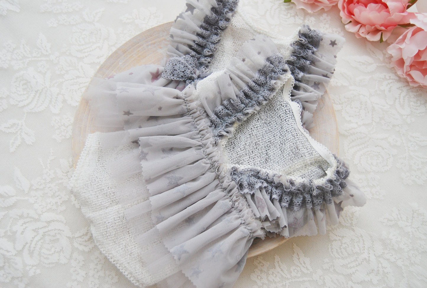 Newborn photo romper for baby girls light gray color, star pattern, ruffled skirt