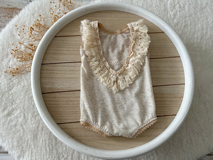 Back view of vintage-inspired romper with V lace neckline