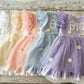 Baby girl first birthday dress with “one” embroidered on front, pastel daisy tulle