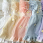 ne year old baby girl birthday dress with embroidered front and pastel color