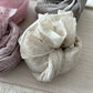Light beige speckled newborn wrap