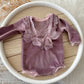 Velvet newborn romper in mauve with lace V-neck –back  view

