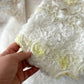 close up on the floral 3D ruffled romper