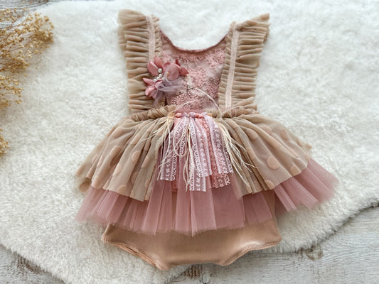 Front view of a baby girl sitter outfit with pink tulle skirt, lace bodice, and 3D flower decorations — perfect for photo shoots.