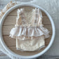 Bohemian newborn romper in cream with lace skirt and ruffles