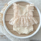 Lace newborn romper for first photo shoot, cream ruffled boho design
