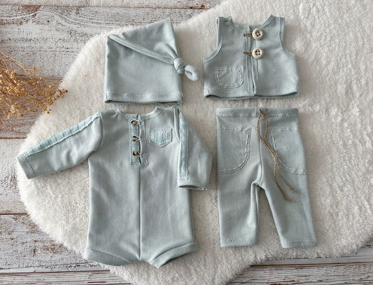 Full 4-piece duck egg blue newborn outfit with romper, hat, vest, and pants