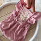 Pink newborn romper with ruffles in boho style