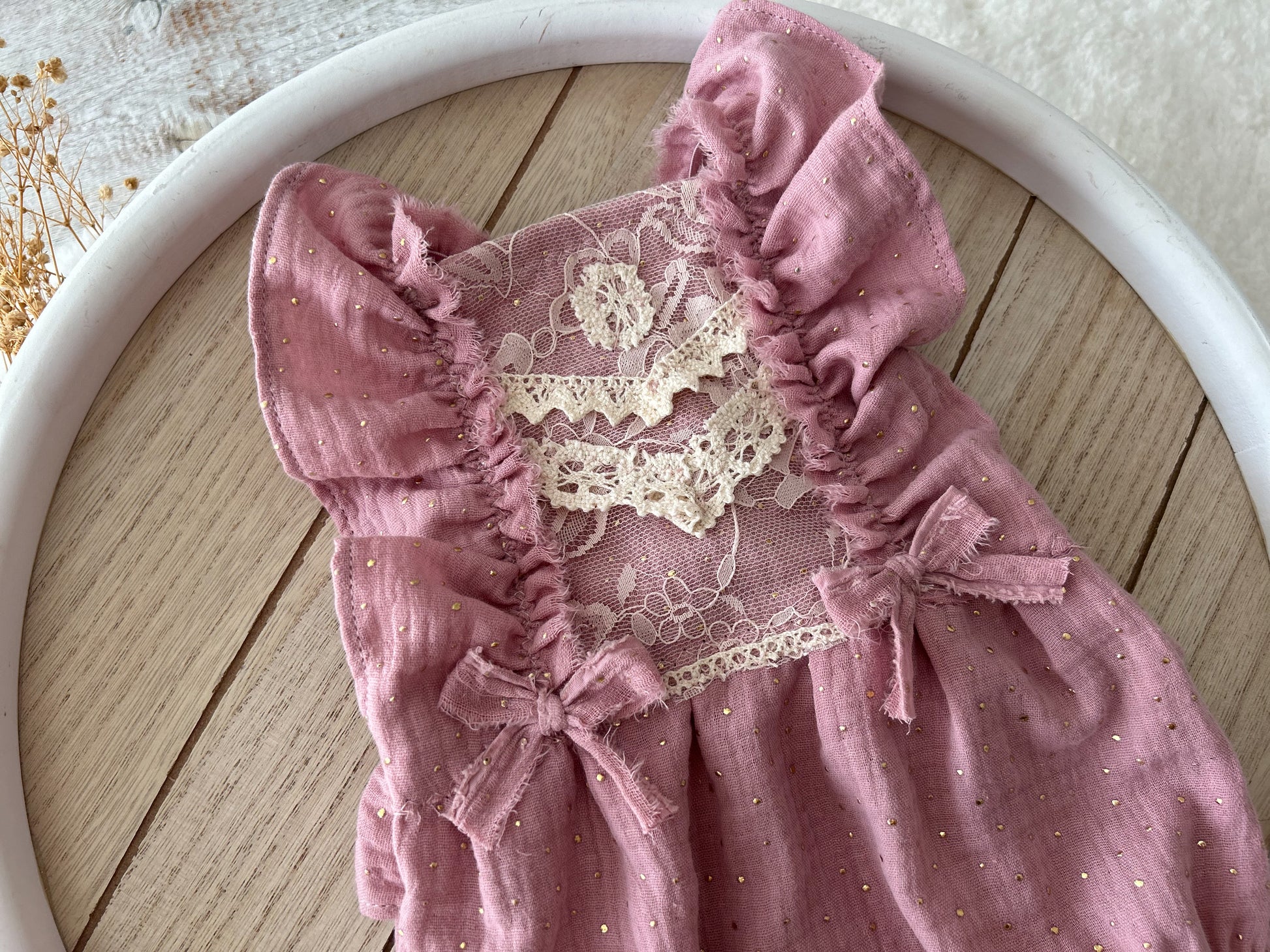 Baby girl photo outfit with lace details on front.