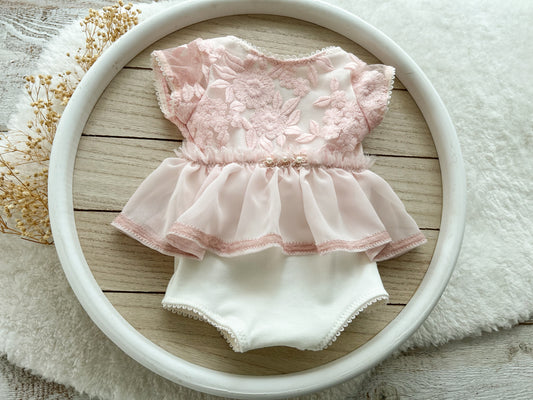 Newborn girl photo outfit in blush pink and white with floral lace and chiffon skirt on a wooden hanger