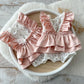 Baby girl outfit with satin shoulder ruffles and layered ruffle back

