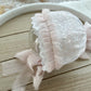 Newborn lace bonnet with chiffon ruffles