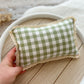 Newborn posing pillow in gingham green and ivory fabric with lace trim, vintage rustic look. 