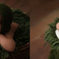 Close-up of the newborn posing pillows showing their soft texture and flexible