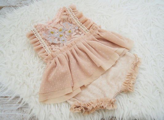 Handmade newborn outfit for baby girl photography shoots with lace and ruffles, pink beige color