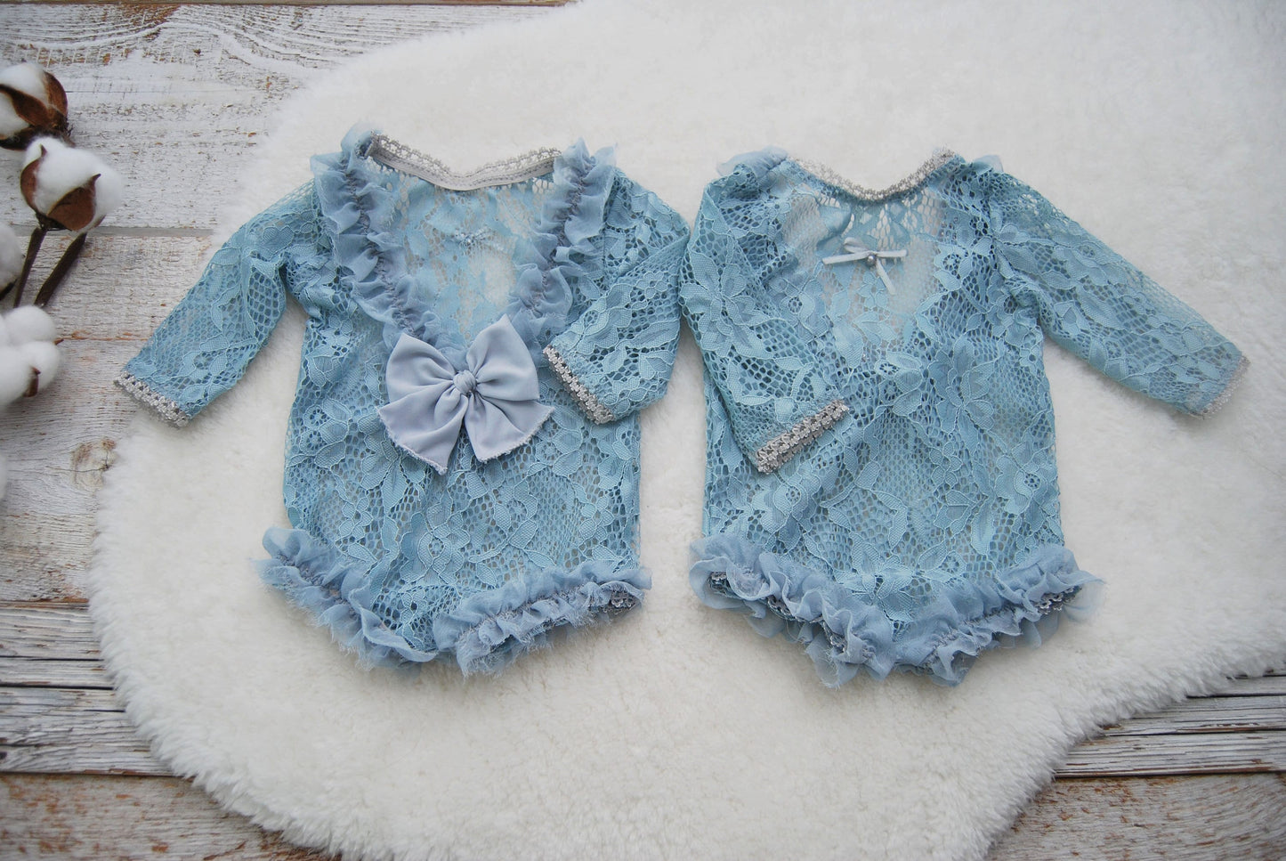 Newborn photo outfit in light blue color, soft and stretchy. This girl romper is made of soft lace with floral texture and features an opened back with ruffles.